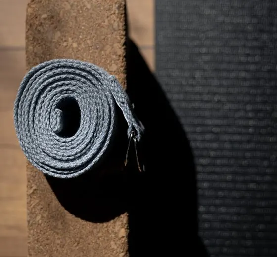 Coiled fabric posture band on a cork block